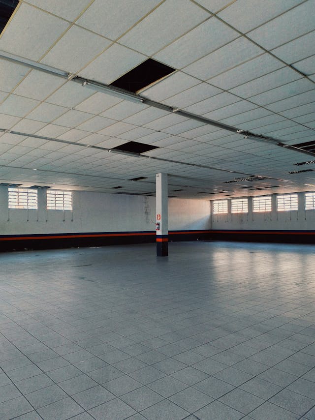 Warehouse floor cleaning in London with clear walkways and working routes
